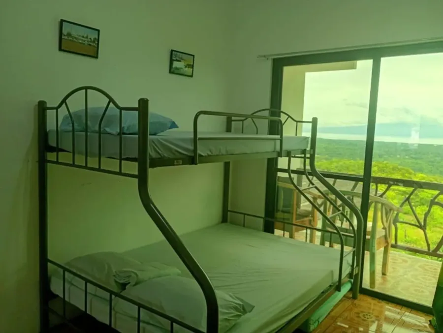 Bunk bed in the family suite, balcony behind