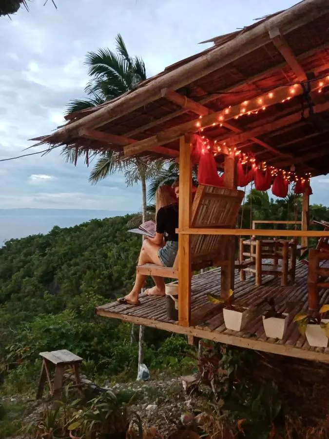 Hut with lights over the jungle